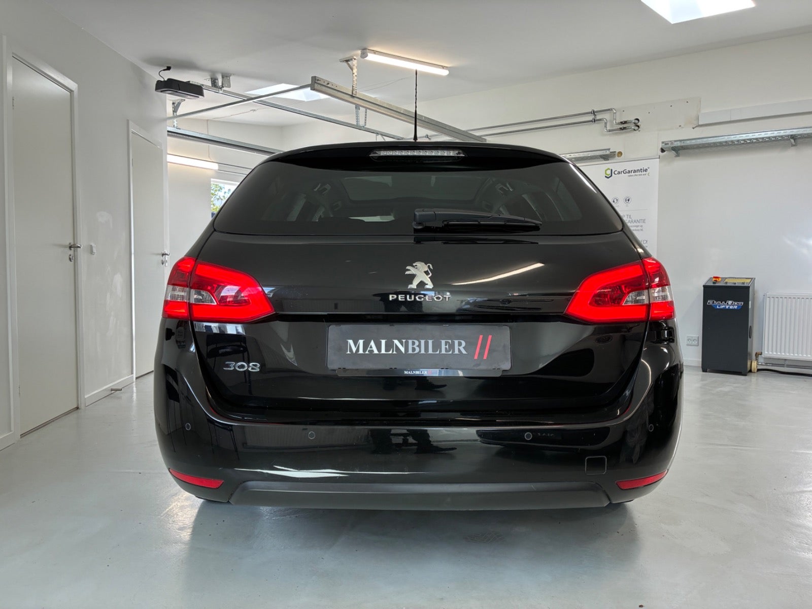 Billede af Peugeot 308 1,2 e-THP 130 Allure Sky SW EAT6