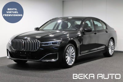 BMW 745e 3,0 aut. Benzin aut. Automatgear modelår 2020 km 14000 Sortmetal ABS airbag, adaptiv fartpi