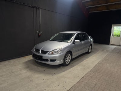 Mitsubishi Lancer 1,6 Invite 4d