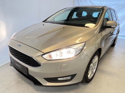 Ford Focus 1,0 SCTi 100 Trend stc. Benzin modelår 2015 km 126000 Champagnemetal træk klimaanlæg ABS 