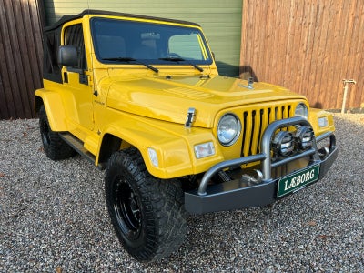 Jeep Wrangler 5,9 aut. Benzin aut. Automatgear modelår 2000 Gul km 54000 træk uden afgift servostyri