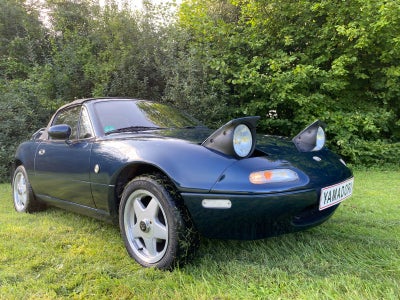 Mazda MX-5 1,6i 16V 90 Benzin modelår 1997 km 77000 Mørkblå nysynet servostyring, Highlights: 
✅En a