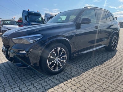 BMW X5 3,0 xDrive45e M-Sport+ aut. Benzin 4x4 4x4 aut. Automatgear modelår 2021 km 86000 Sortmetal n