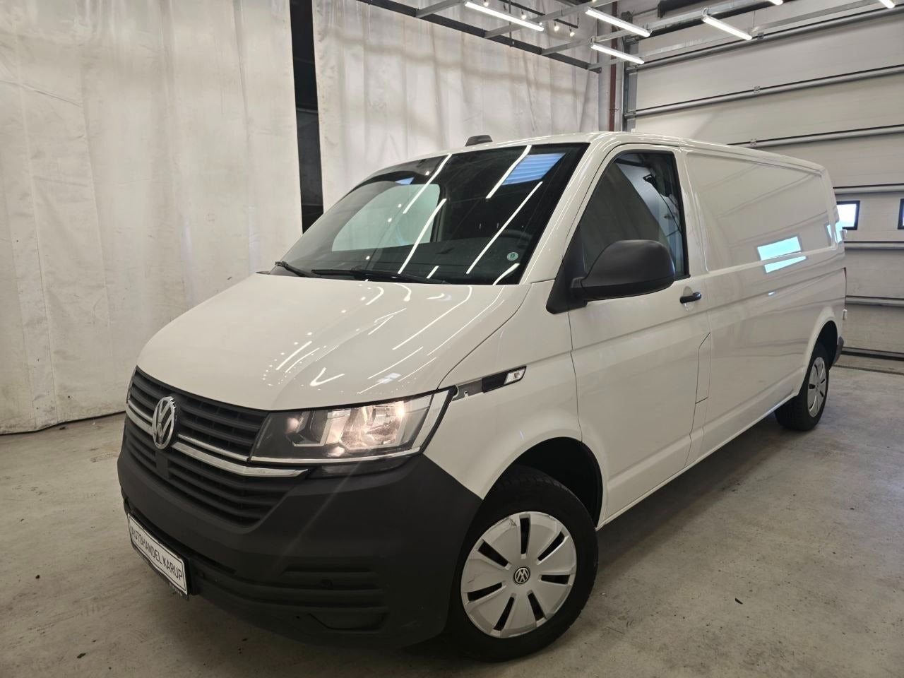 VW Transporter TDi 110 Kassevogn lang