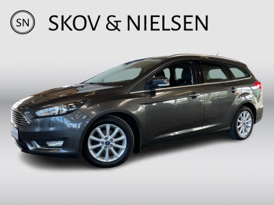 Ford Focus 1,0 SCTi 125 Titanium stc. Benzin modelår 2015 km 95000 Koksmetal træk klimaanlæg ABS air