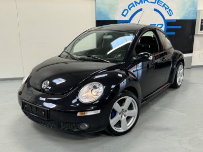 VW New Beetle 1,6 Trendline Benzin modelår 2009 km 292000 Sort træk nysynet ABS airbag alarm central