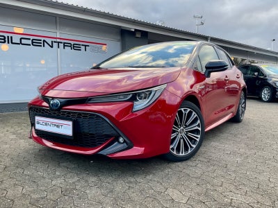 Toyota Corolla 1,8 Hybrid H3 Design MDS Benzin aut. Automatgear modelår 2020 km 30000 Rødmetal ABS a