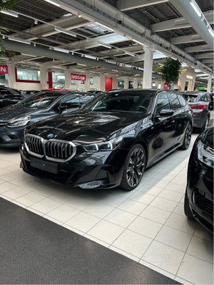 BMW i5 eDrive40 Touring Fully Charged M-Sport billede 2