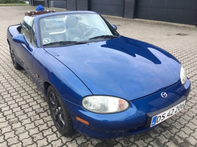 Mazda MX-5 1,8i Jubilæum Benzin modelår 1999 km 215000 Mørkblåmetal nysynet ABS airbag centrallås, U