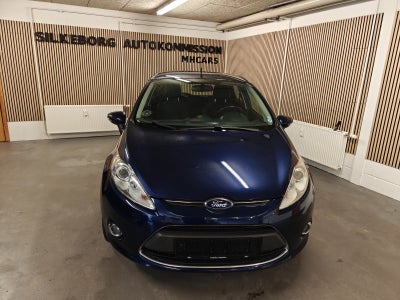 Ford Fiesta 1,4 Titanium Benzin modelår 2012 km 210000 Mørkblåmetal træk nysynet ABS airbag centrall