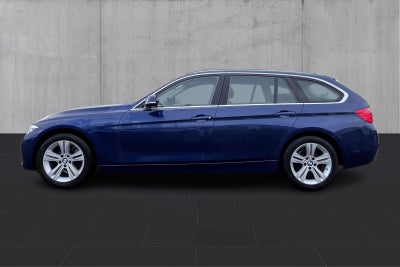 BMW 320d Touring Executive aut. - 1