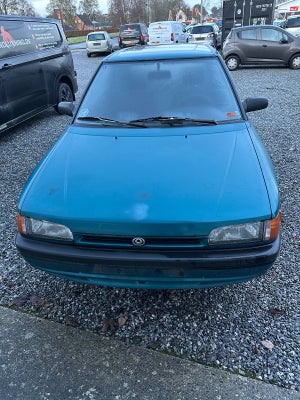 Mazda 323 1,3 Spring 4d