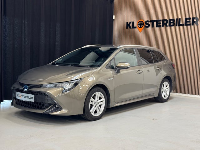 Hybrid-Benzin Modelår 2020 Kilometer 99.000 Drivmiddel Hybrid-Benzin Toyota Corolla 1,8 Hy