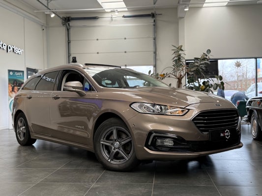 Ford Mondeo HEV Titanium stc. CVT Benzin drivmiddel 127000 Km. 2020 Modelår
