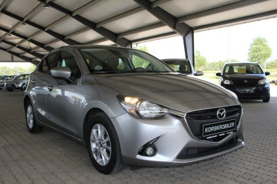 Mazda 2 1,5 SkyActiv-G 90 Vision Benzin modelår 2015 km 75000 Koksmetal nysynet ABS airbag startspær
