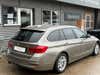 BMW 320i Touring aut. thumbnail