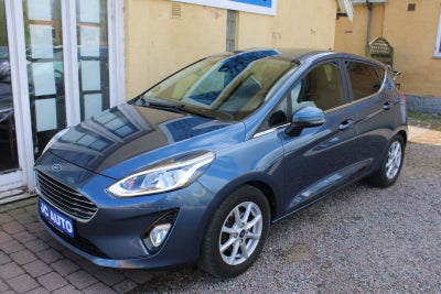 J.C Biler ApS - Ford Fiesta EcoBoost mHEV Titanium