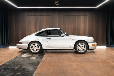 Porsche 911 3,6 Carrera 4 Coupé Benzin 4x4 4x4 modelår 1991 km 136800, uden afgift, Om Bilen:

Fuld 