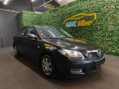 Mazda 3 1,6 Touring 4d