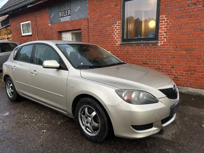 Mazda 3 1,6 Touring 4d