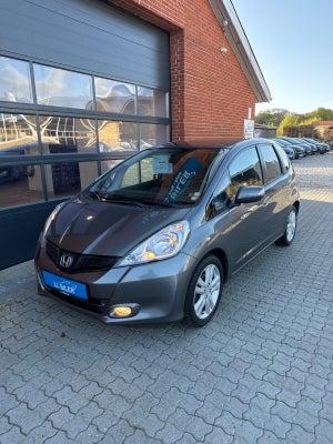 Honda Jazz 1,4 Comfort+ Benzin modelår 2015 km 43000 Gråmetal klimaanlæg ABS airbag alarm startspærr