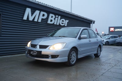 Mitsubishi Lancer 1,6 Invite 4d
