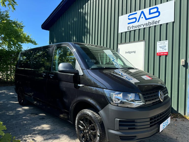 VW Transporter TDi 102 Kassevogn lang
