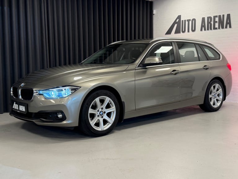 BMW 320i Touring Advantage aut.