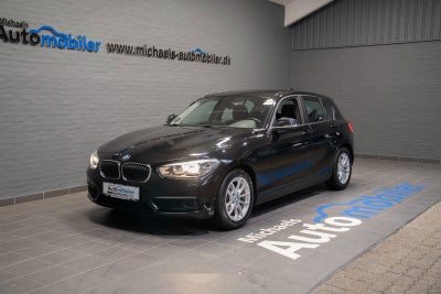 BMW 118i 1,5 Connected aut. Benzin aut. Automatgear modelår 2018 km 95000 Sort ABS airbag, Pæn og ve