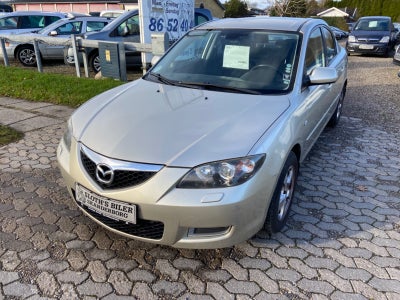 Mazda 3 1,6 Touring 4d