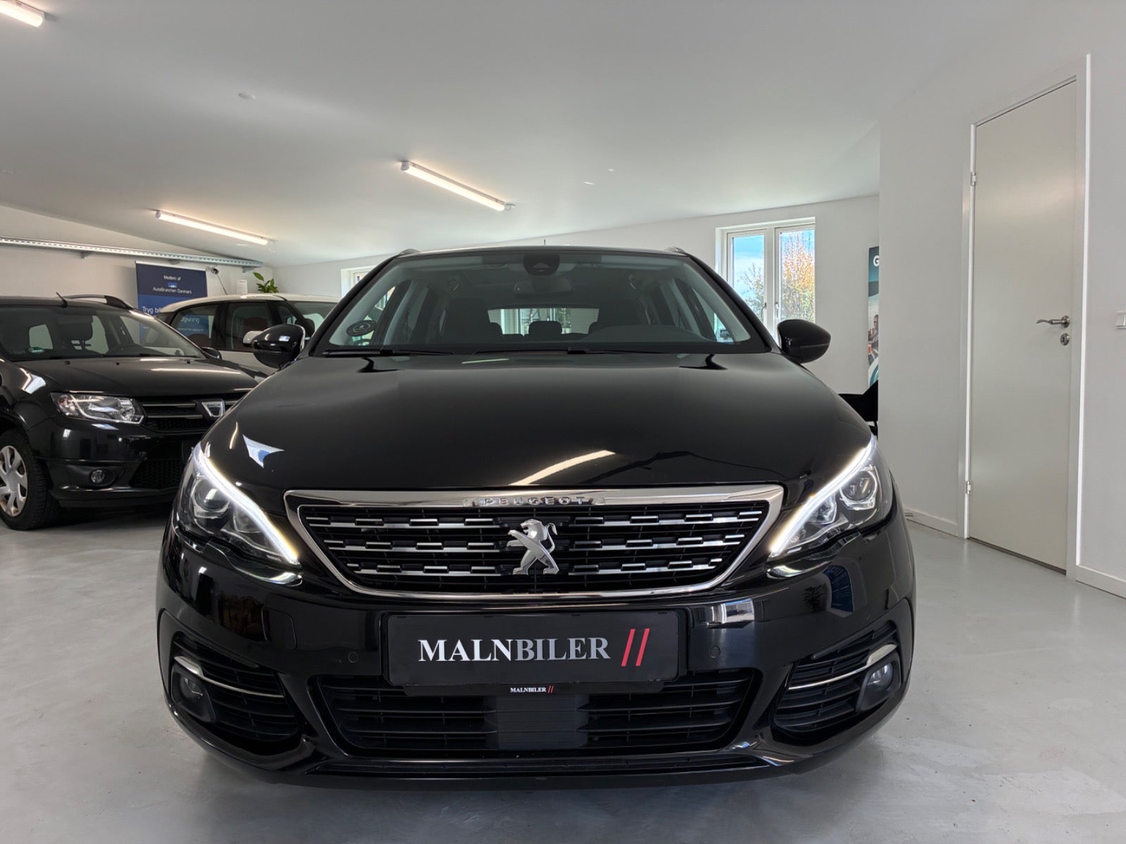 Billede af Peugeot 308 1,2 e-THP 130 Allure Sky SW EAT6