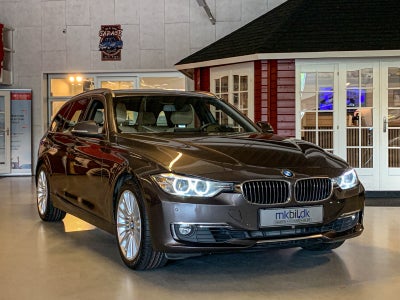 BMW 330d 3,0 Touring Luxury Line aut. Diesel aut. Automatgear modelår 2013 km 83000 Gråmetal ABS air