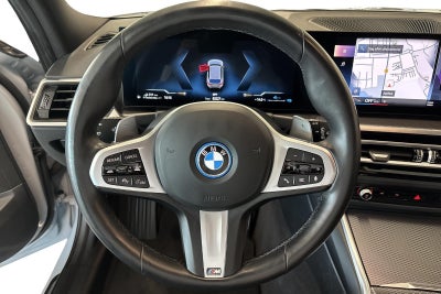 BMW 320e Touring M-Sport aut.