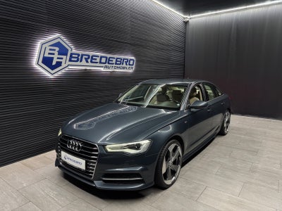 Audi A6 3,0 TDi 218 S-tr. 4d